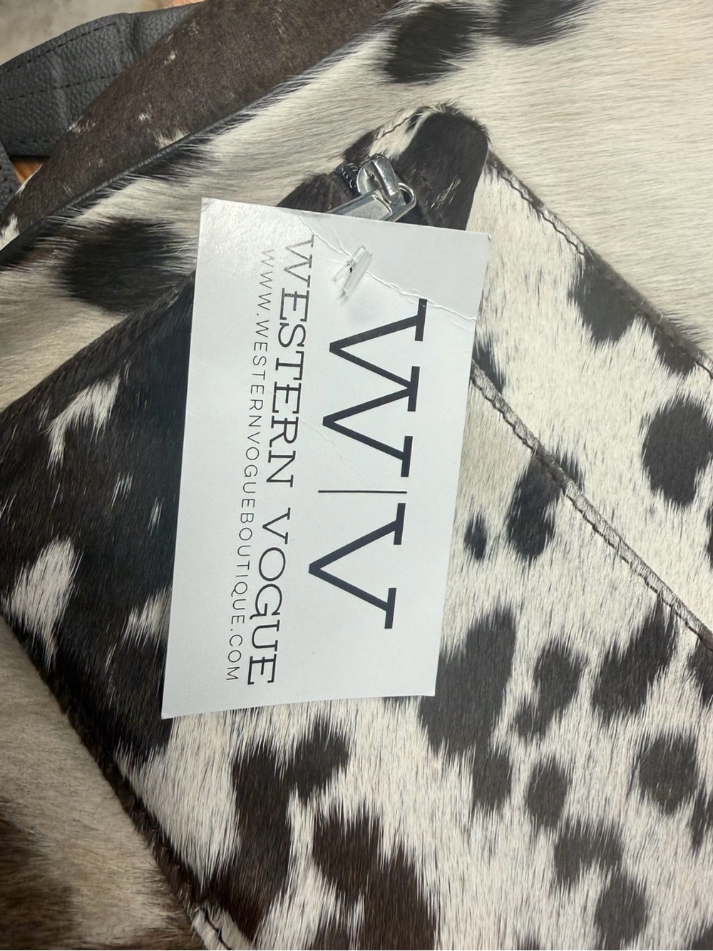 Cowhide Pattern Sling Backpack in Black & White - Picture 2 of 3